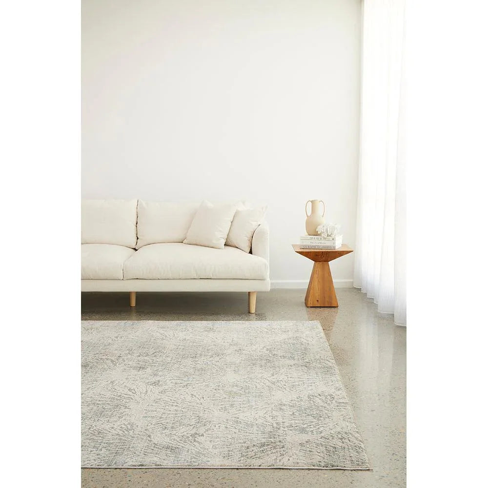 Emma Blomfield Plume Frost Rug in ash grey, ivory with subtle pattern on soft cream background, hand-tufted wool