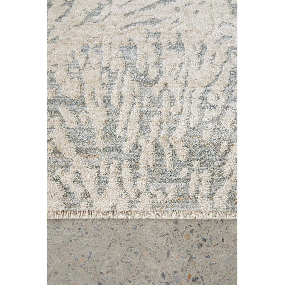 Emma Blomfield Plume Frost Rug featuring abstract pattern in cream, ivory, blue-grey on ivory background, hand-tufted wool