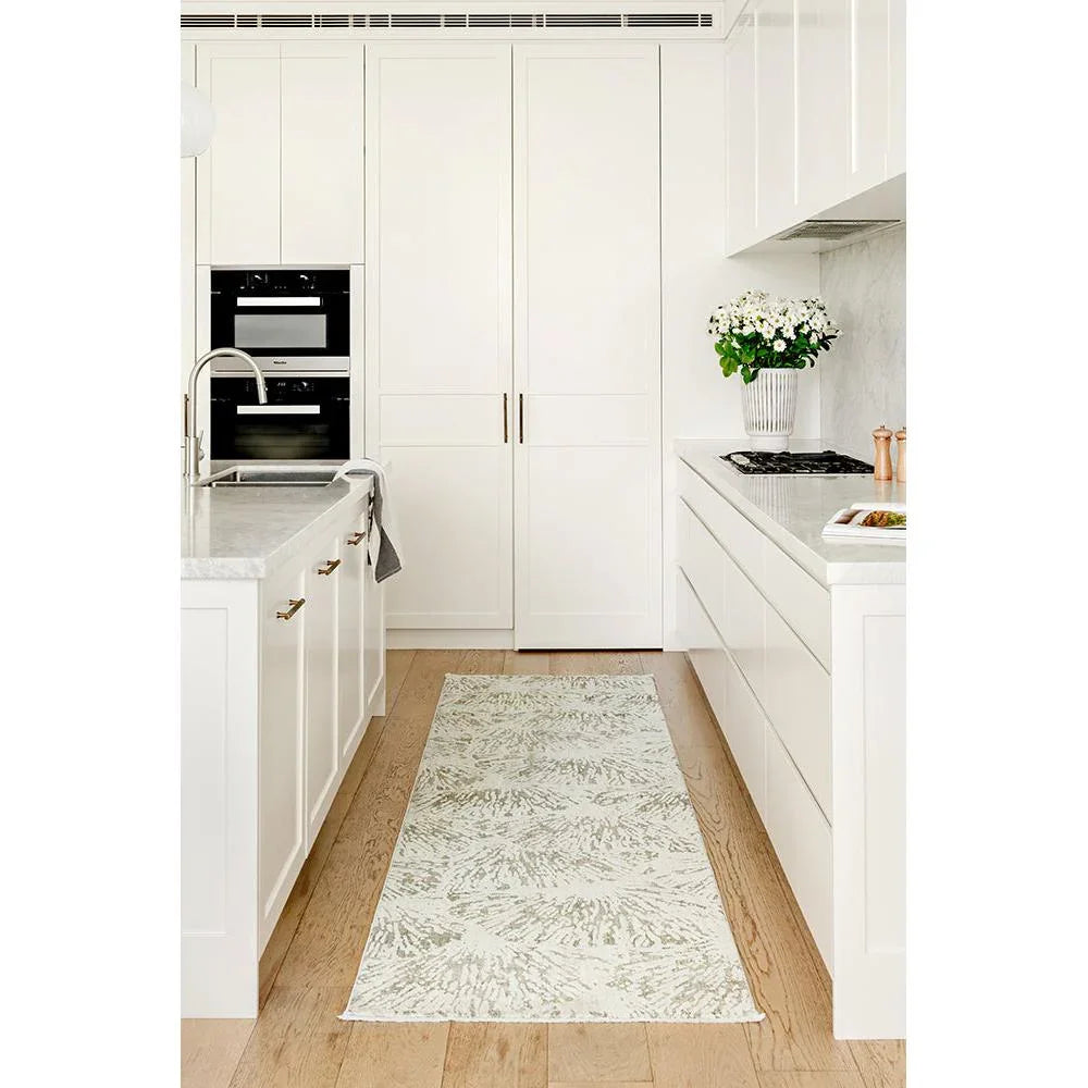 Emma Blomfield Plume Moss Runner Rug featuring botanical fern pattern in moss green and sage on ivory, power-loomed wool