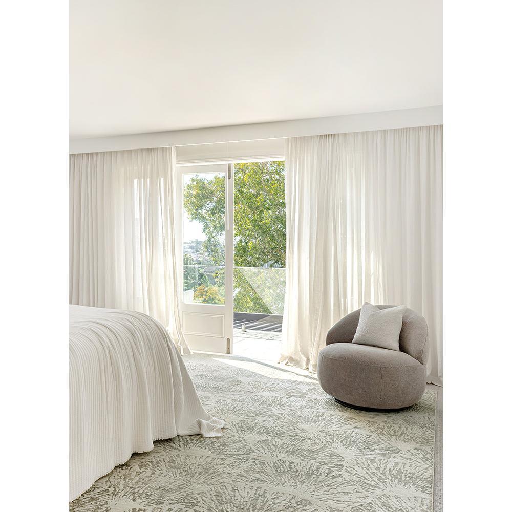 Emma Blomfield Plume Moss Rug featuring plume pattern in cream, pale grey and sage on ivory background, hand-tufted wool