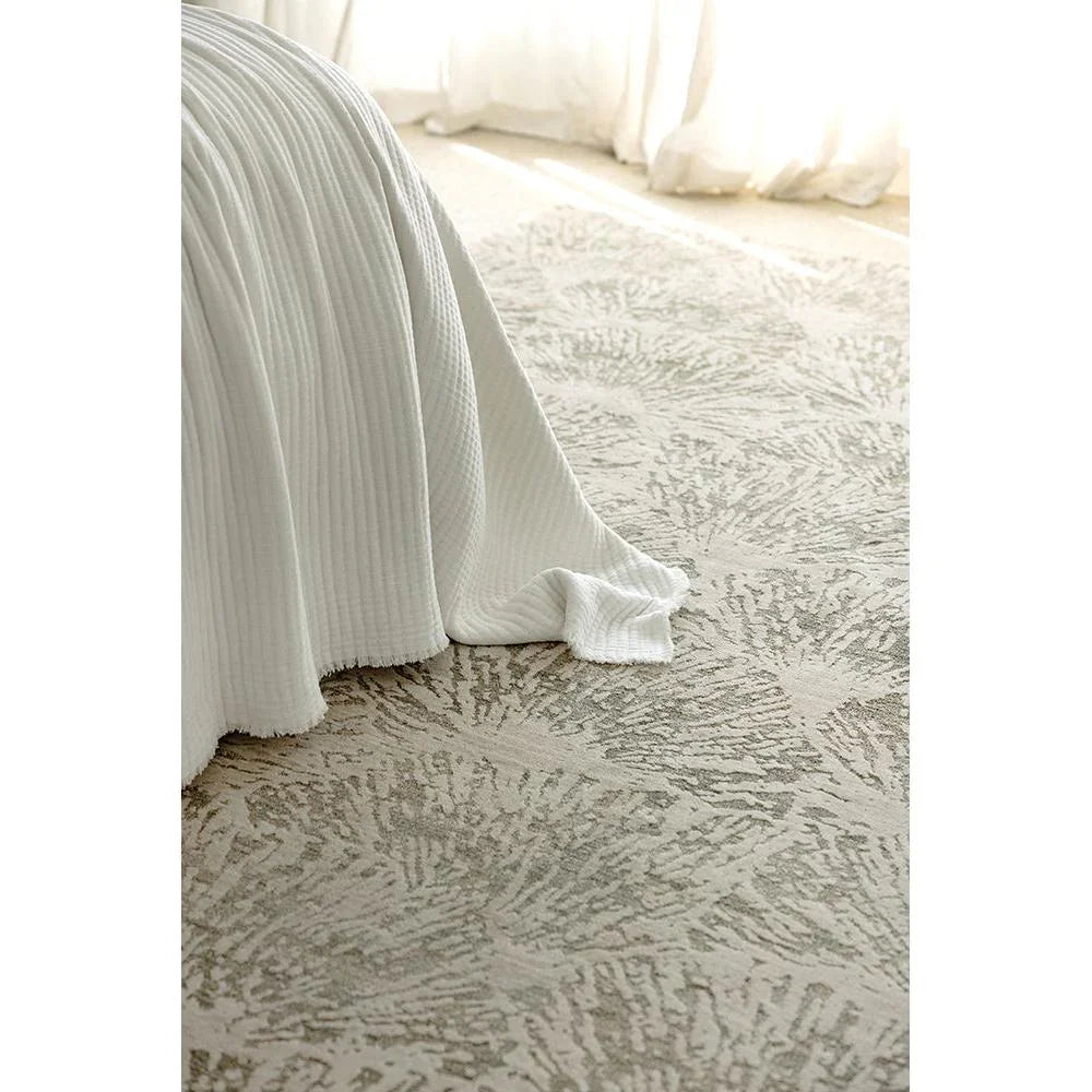 Emma Blomfield Plume Moss Rug featuring organic tufted pattern in taupe beige and ivory on cream background, tufted wool