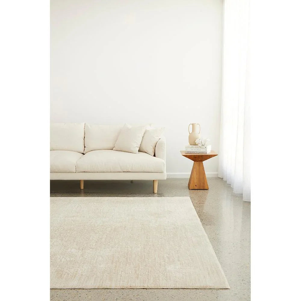 Emma Blomfield Rogue Linen Rug featuring textured weave in cream, ivory and pale beige on ivory background, woven linen
