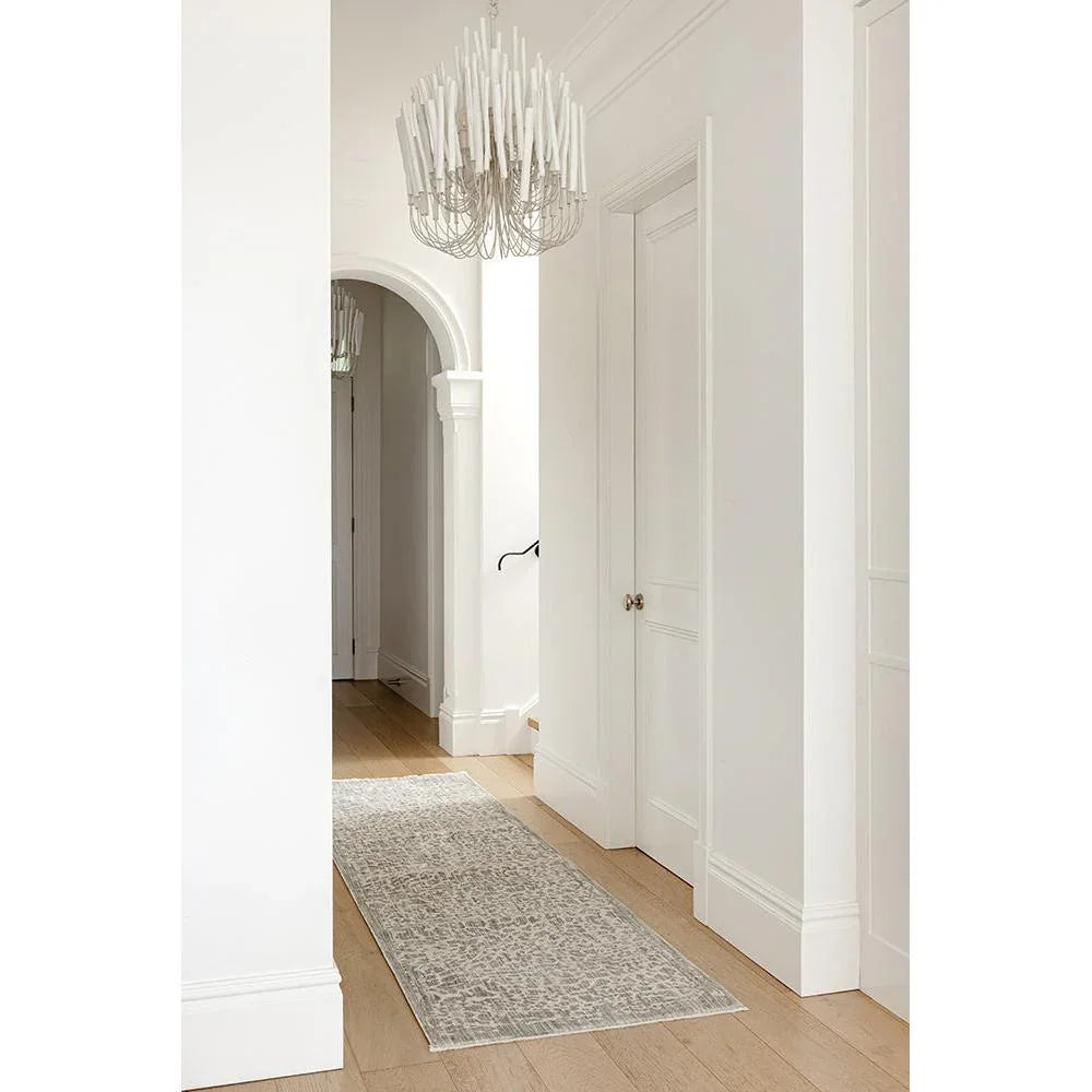 Emma Blomfield Rogue Mist Runner Rug featuring a distressed pattern in pale grey and ivory on cream, hand-tufted wool