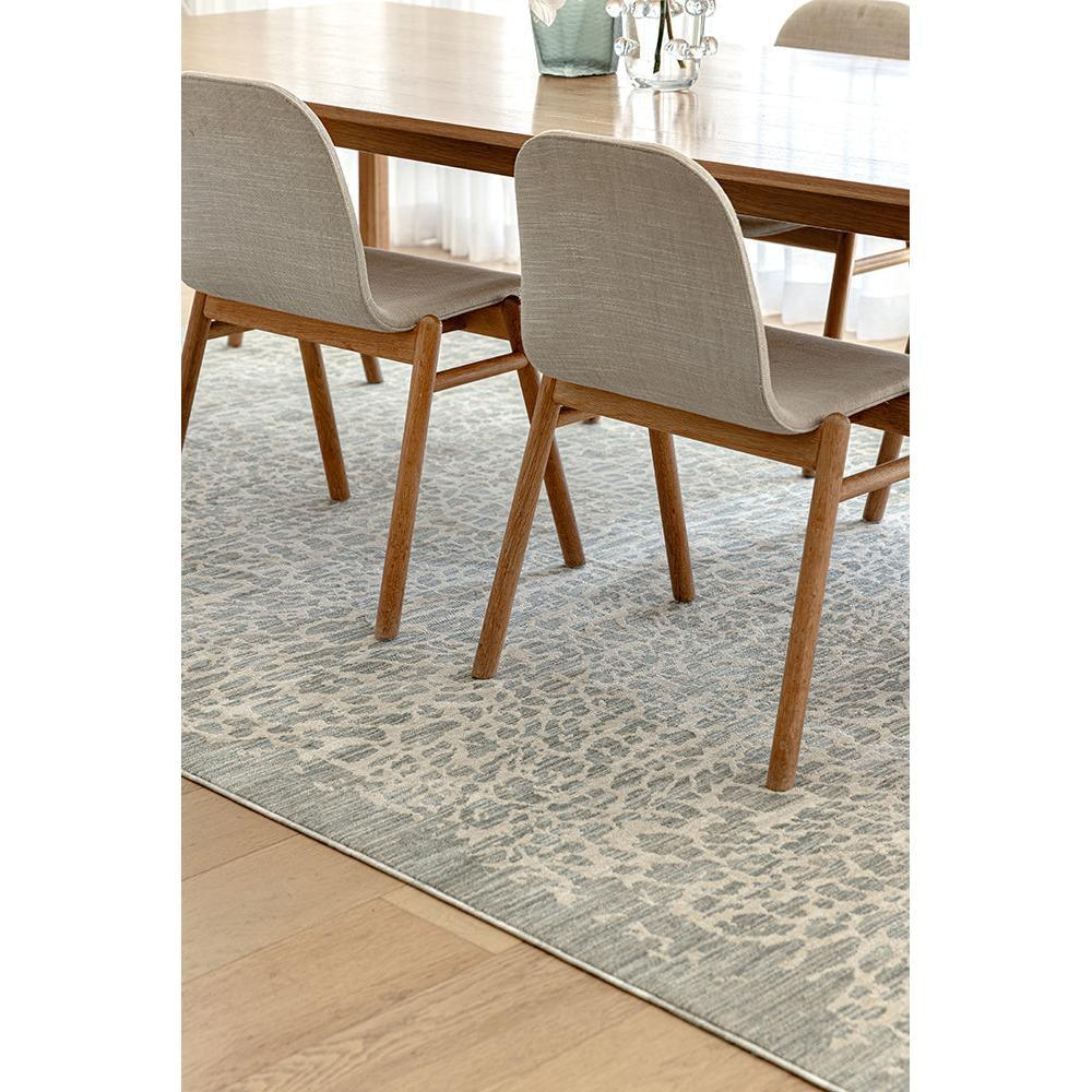 Emma Blomfield Rogue Mist Rug featuring abstract mottled pattern in mist blue-grey and ivory on grey, tufted wool