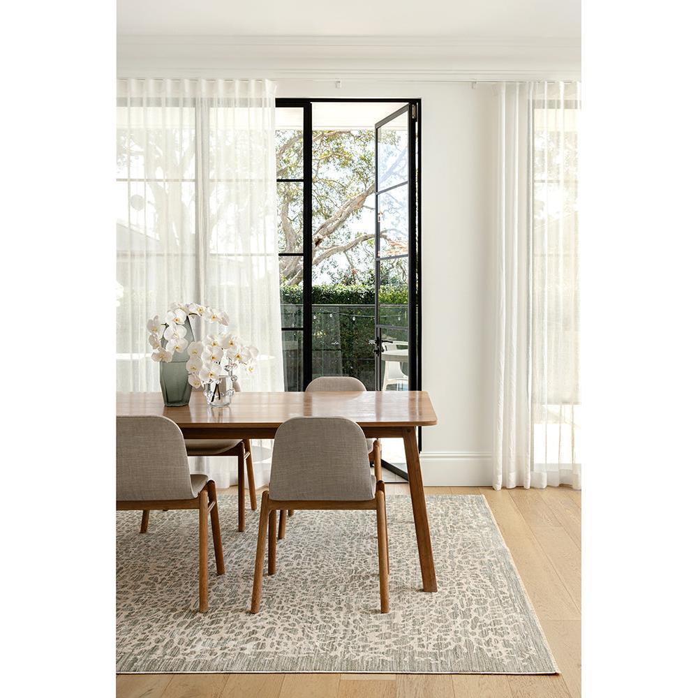 Emma Blomfield Rogue Mist Rug featuring abstract mottled pattern in pale grey, ivory and taupe on grey background, hand-tufted wool