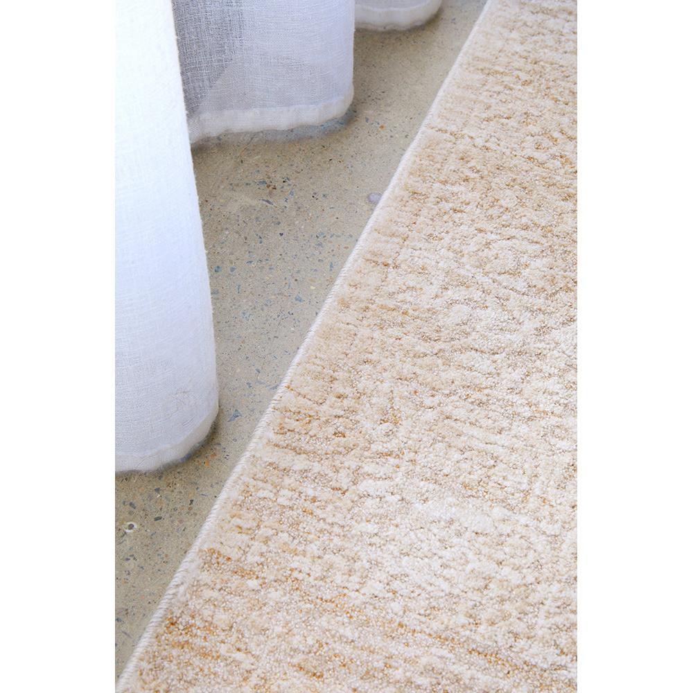 Emma Blomfield Veil Natural Runner Rug with textured shag in cream, beige and taupe on grey background, tufted wool