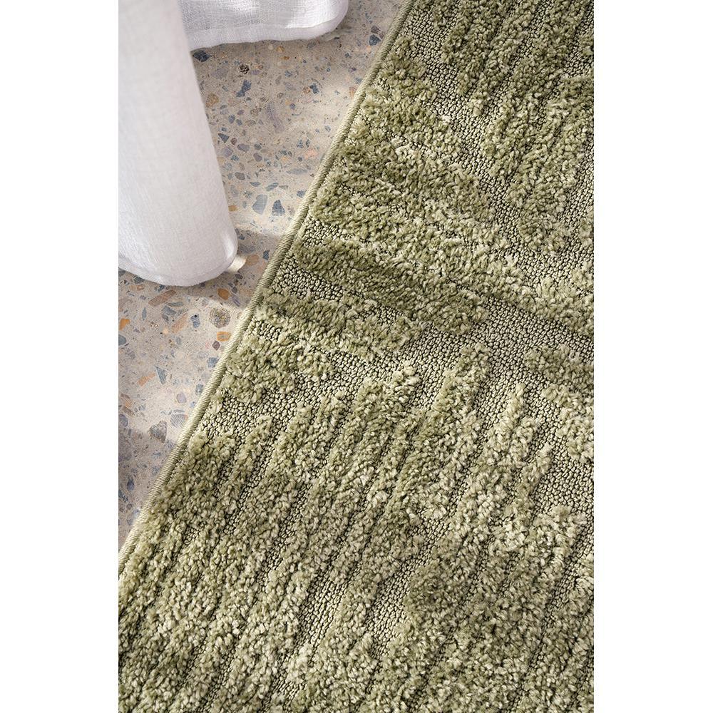 Marigold Shilo Green Runner Rug featuring shaggy textured pattern in olive, sage and moss on light beige floor, hand-tufted wool