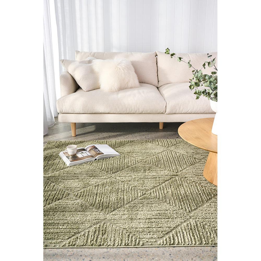 Marigold Shilo Green Rug featuring geometric chevron pattern in olive green, sage, cream on cream background, hand-tufted wool