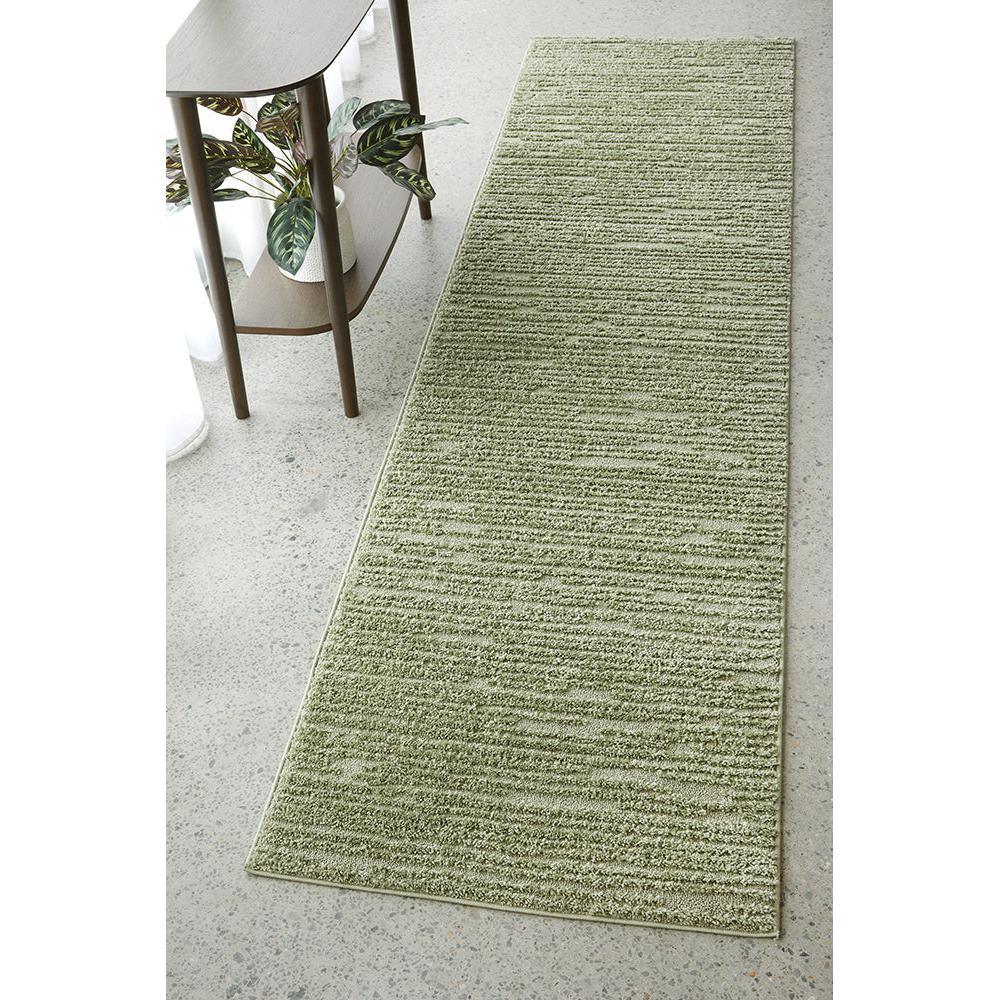 Marigold Suri Green Runner Rug featuring textured striped pattern in sage-green and olive on pale background, Rug Culture