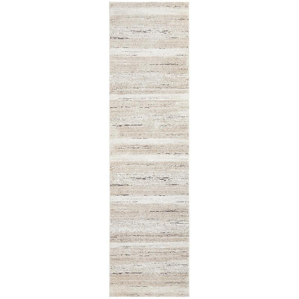 Beige and white striped runner rug on a white background