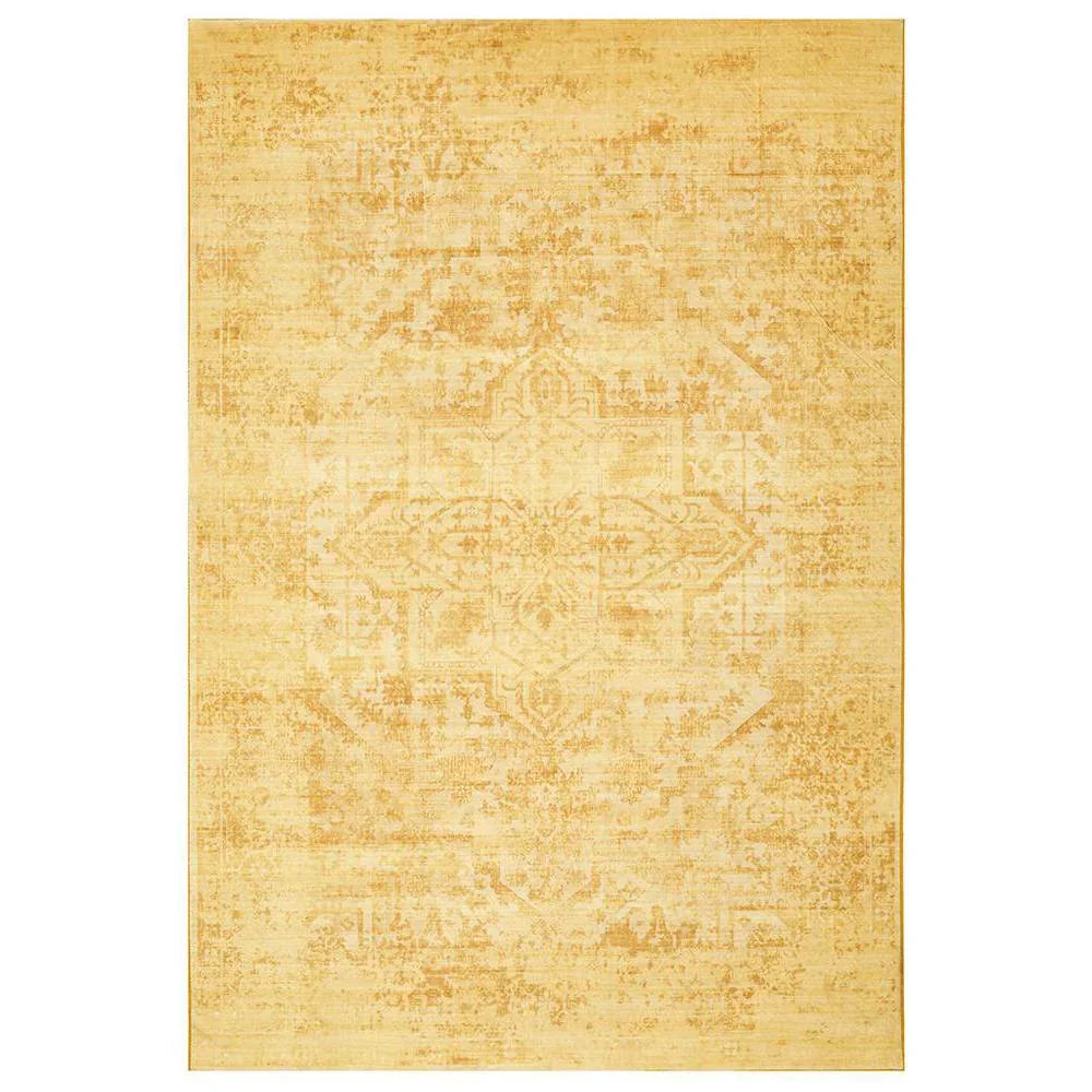 Gemstone Amber Rug featuring distressed vintage pattern in amber, ochre and cream on warm golden background, hand-tufted wool