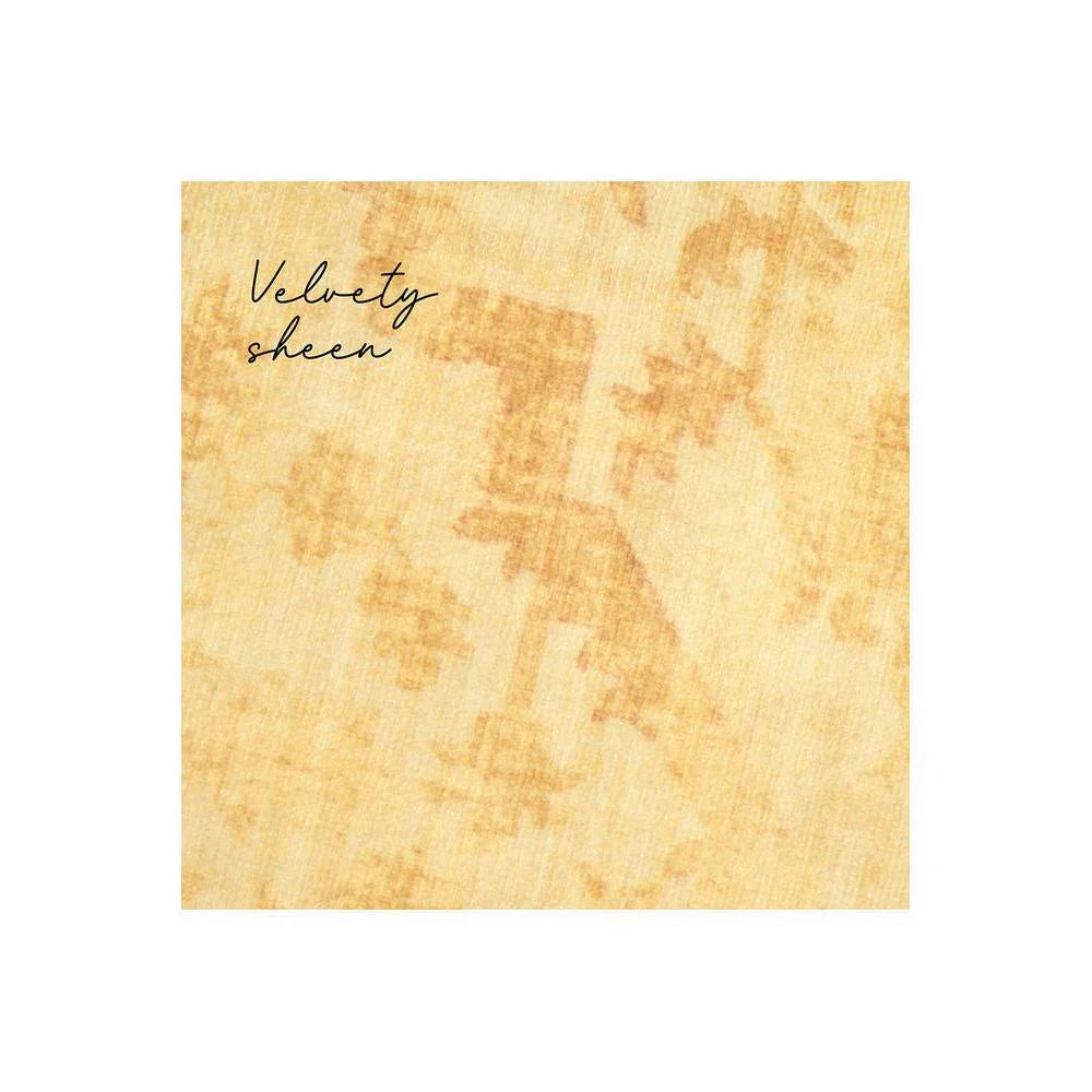 Gemstone Amber Rug featuring abstract mottled pattern in amber, gold and cream on pale yellow background, hand-tufted wool