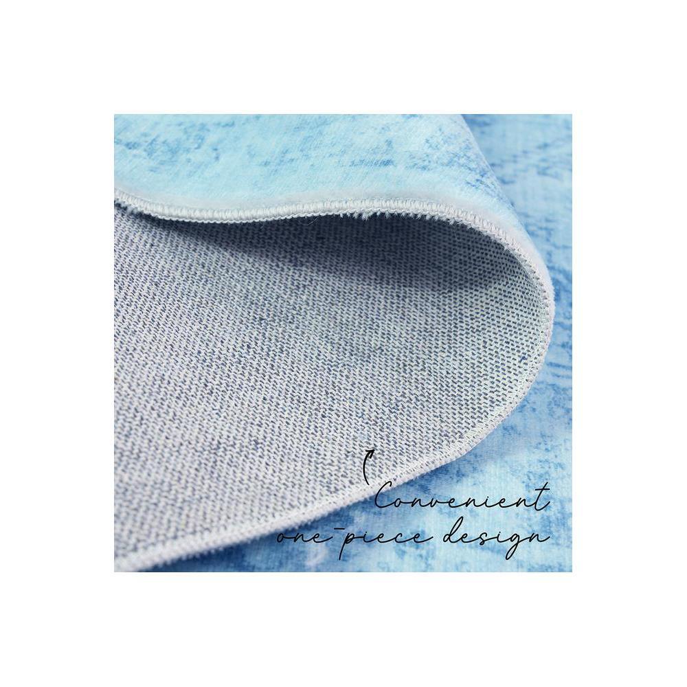 Gemstone Aquamarine Rug featuring a denim-inspired woven pattern in aquamarine, sky blue & teal on pale blue, machine-loomed polyester