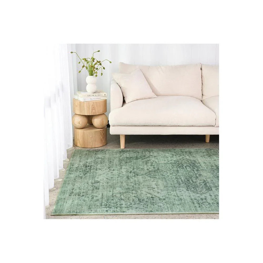 Gemstone Emerald Green Rug featuring distressed vintage pattern in emerald green, sage and mint on cream background, hand-tufted wool