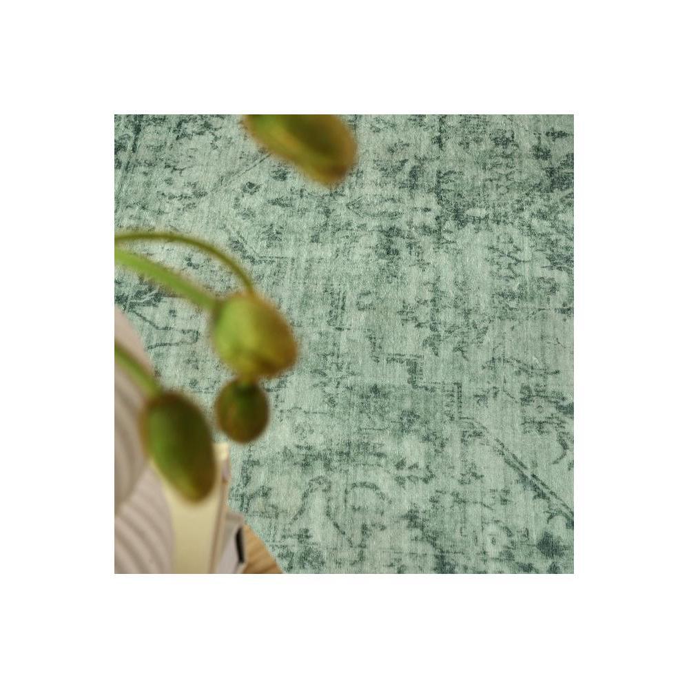 Gemstone Emerald Green Rug featuring distressed pattern in emerald green and sage on pale mint background, hand-tufted wool