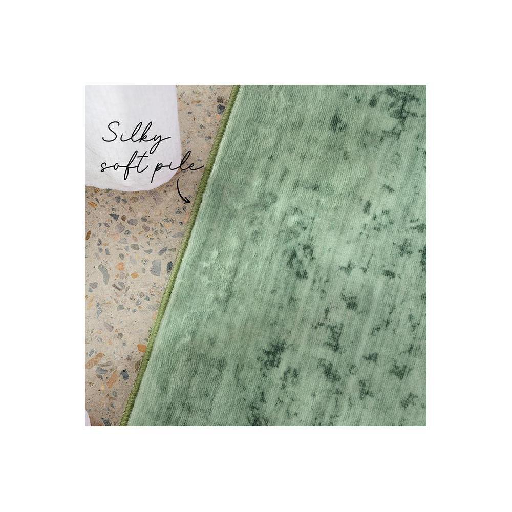 Gemstone Emerald Green Rug featuring plush emerald green pile with darker speckles on pale terrazzo background, hand-tufted wool