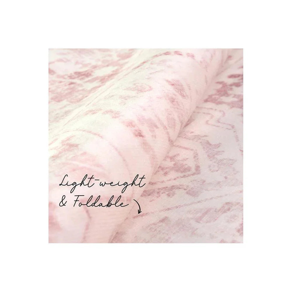 Gemstone Rose Quartz Rug featuring marble-inspired pattern in blush pink, rose & ivory on pale pink background, lightweight wool