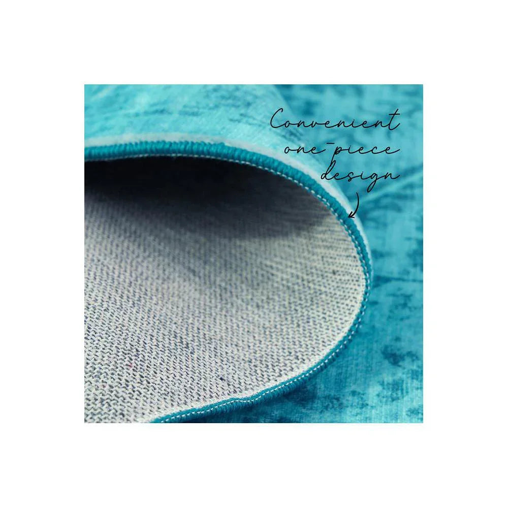 Gemstone Topaz Rug featuring one-piece design in turquoise/teal with beige underside on teal background, machine-made textile