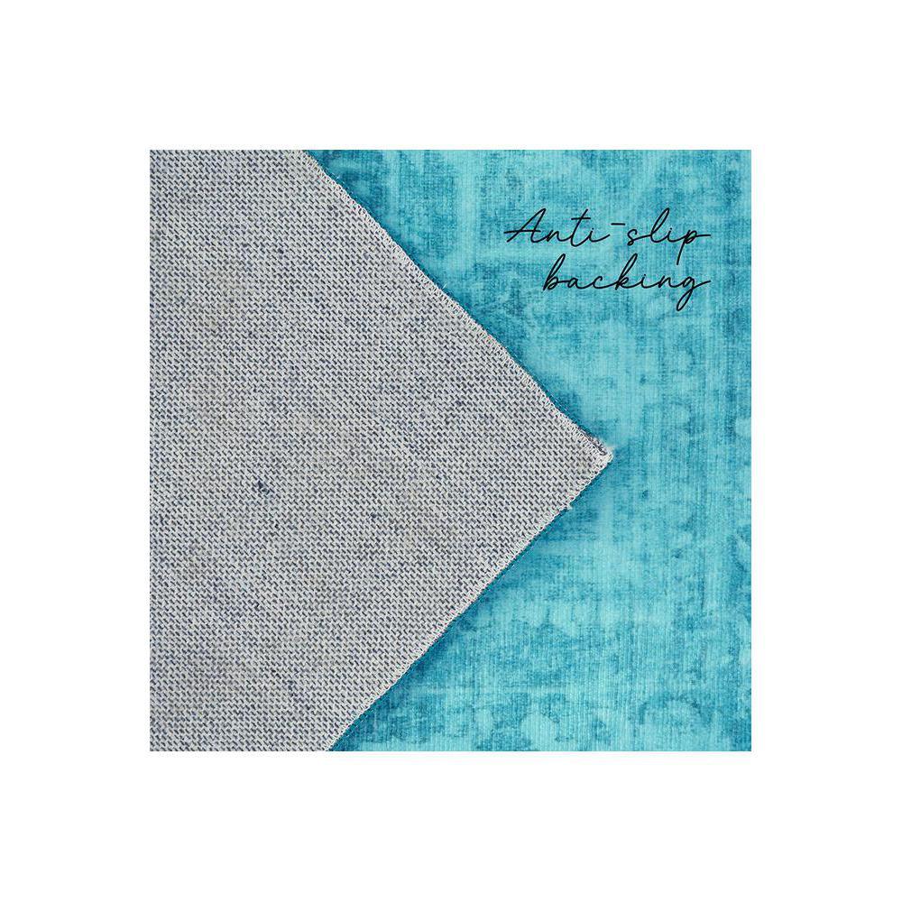 Gemstone Topaz Rug featuring contemporary weave in turquoise and grey on teal background, anti-slip backing, hand-tufted wool