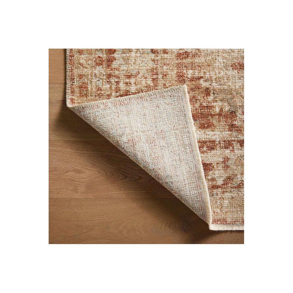 Heritage Brick Rug featuring traditional pattern in brick red, cream, taupe on beige background, machine-made polypropylene blend