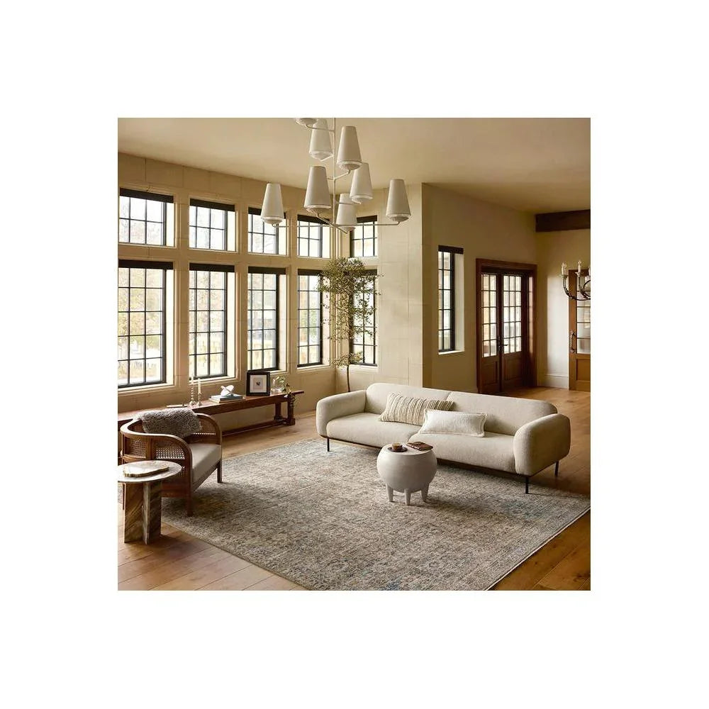Heritage Spa Rug featuring traditional pattern in muted blue, ivory and taupe on beige background, hand-tufted wool