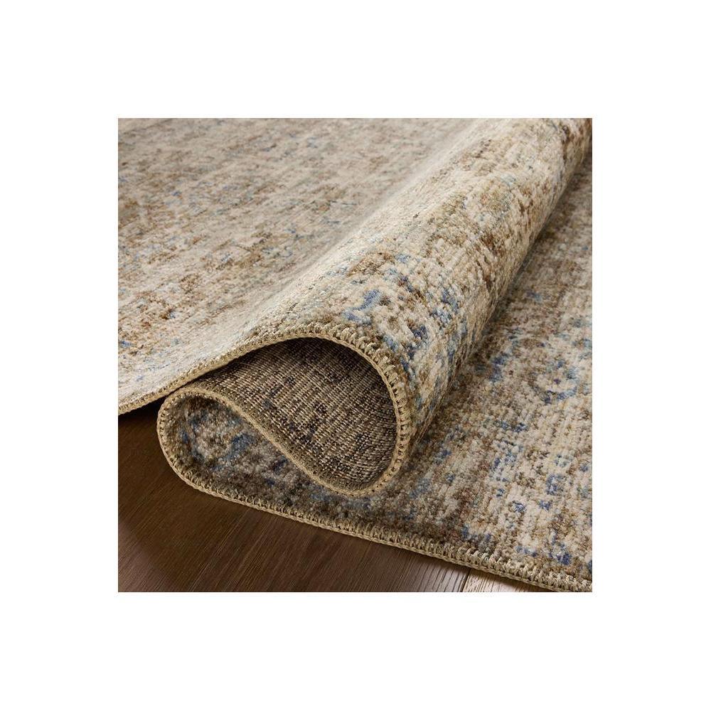 Heritage Spa Rug featuring distressed vintage pattern in beige, taupe and blue on cream background, machine-woven wool-blend