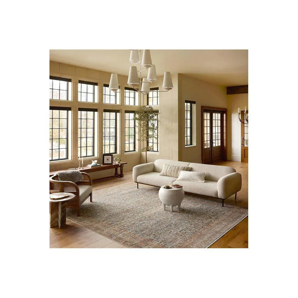 Heritage Blue Rug featuring traditional pattern in blue, ivory, taupe and beige on cream background, hand-tufted wool