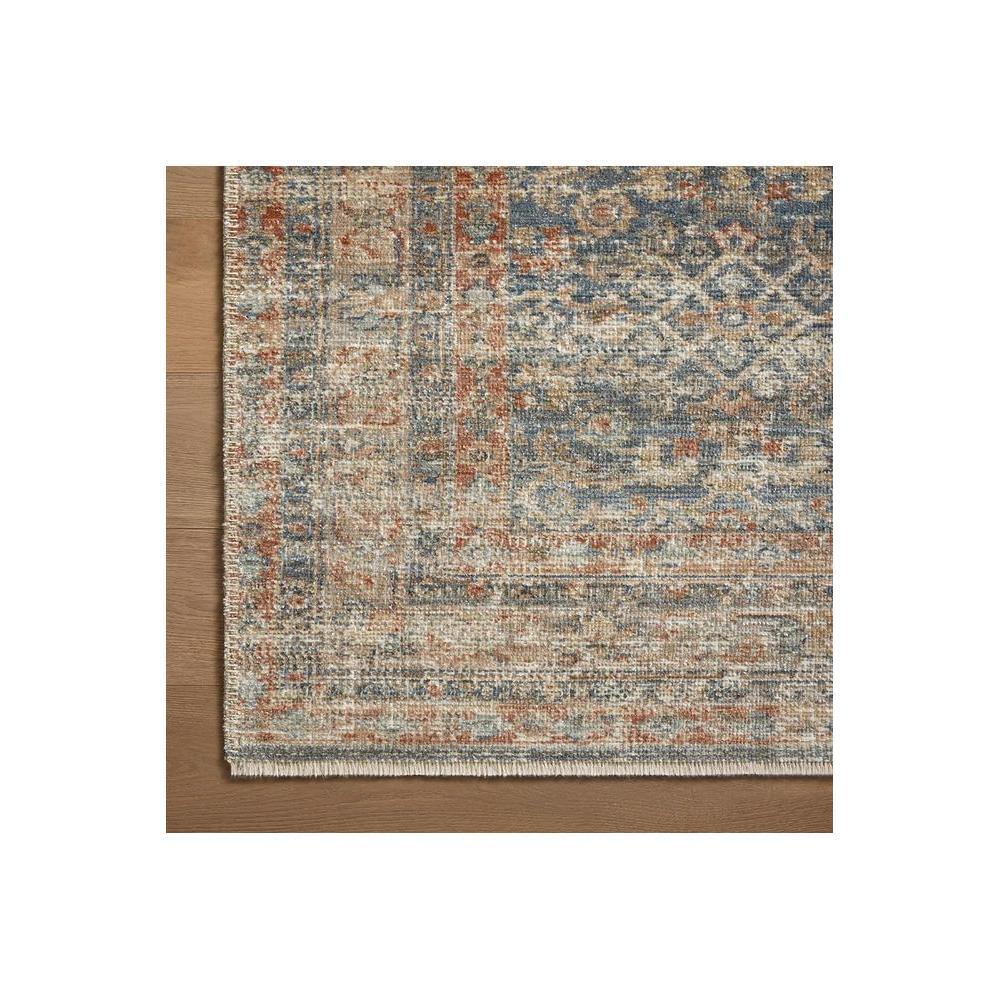 Heritage Blue Rug featuring traditional oriental pattern in navy blue, dusty blue, camel beige, ivory on cream background, hand-tufted wool