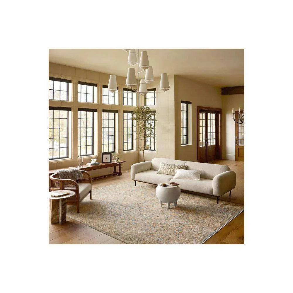 Heritage Ocean Rug featuring distressed floral pattern in beige, powder blue, taupe on ivory background, hand-tufted wool