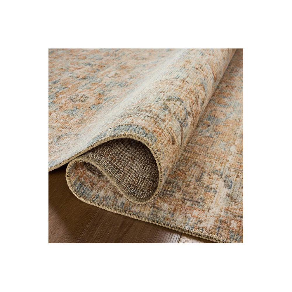 Heritage Ocean Rug featuring distressed floral pattern in cream, beige, powder blue and terracotta on beige background, hand-tufted wool