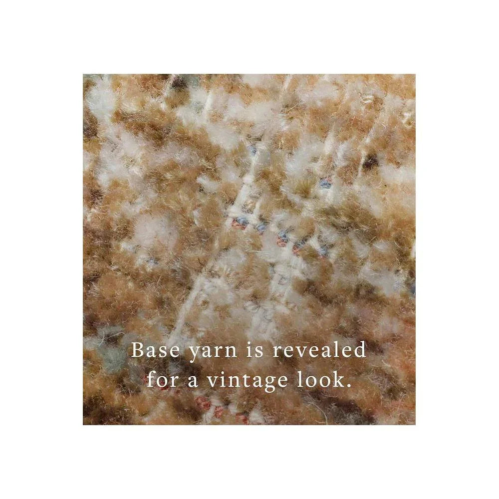 Heritage Ocean Rug featuring vintage textured pattern in tan, beige, cream and pale blue on white background, hand-woven wool