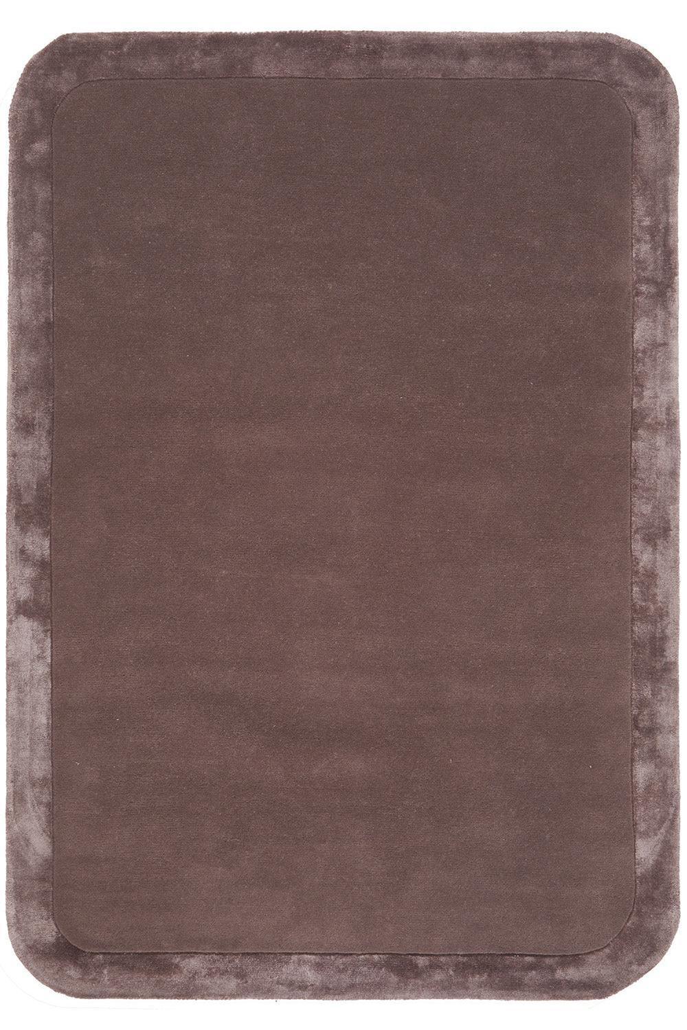 Rectangular brown bath mat with a textured surface