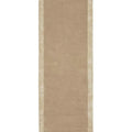 Hugo Husk Runner Rug featuring solid minimalist design in camel, beige and taupe on warm beige background by Rug Culture