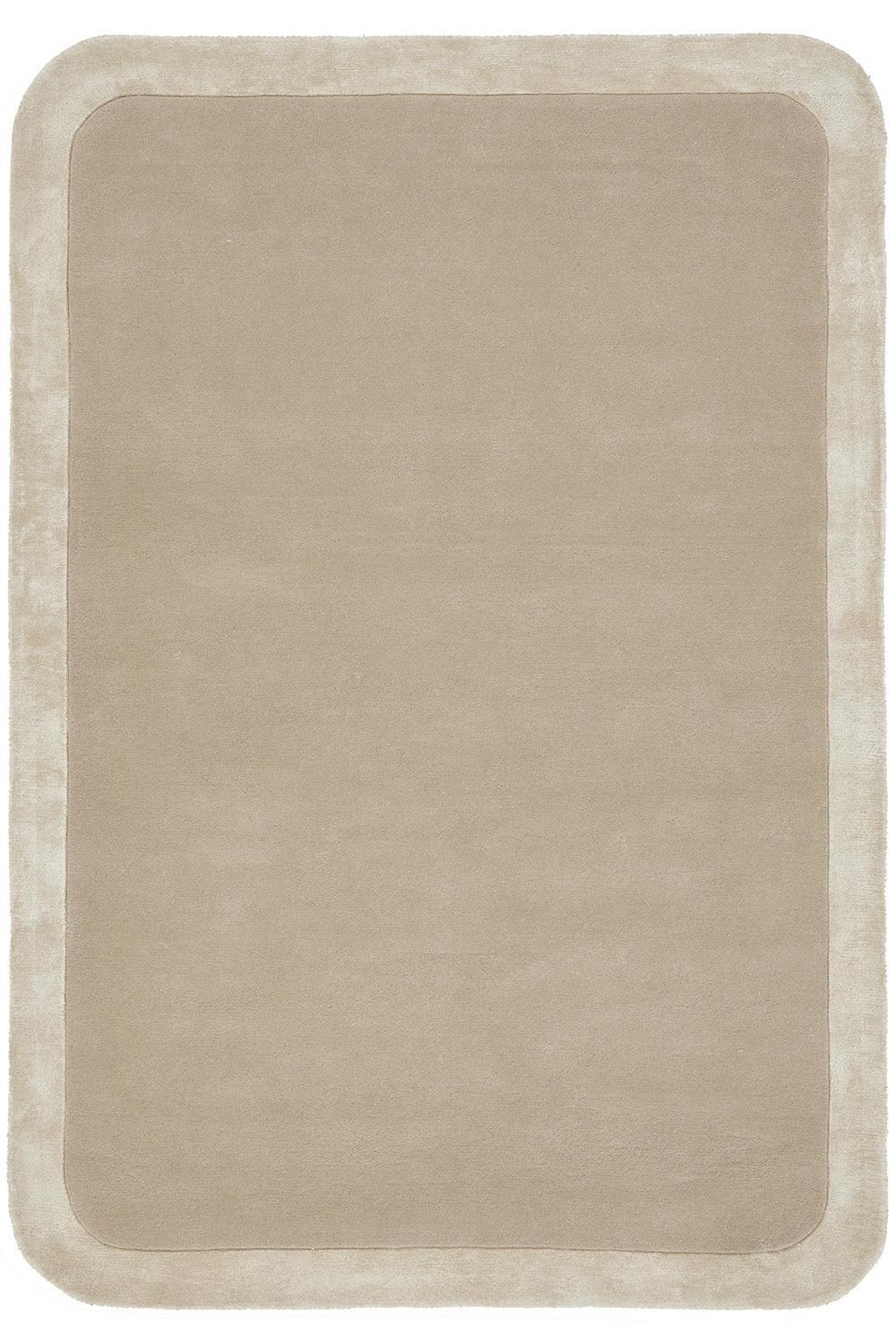 Beige bath mat with a striped border on a white background