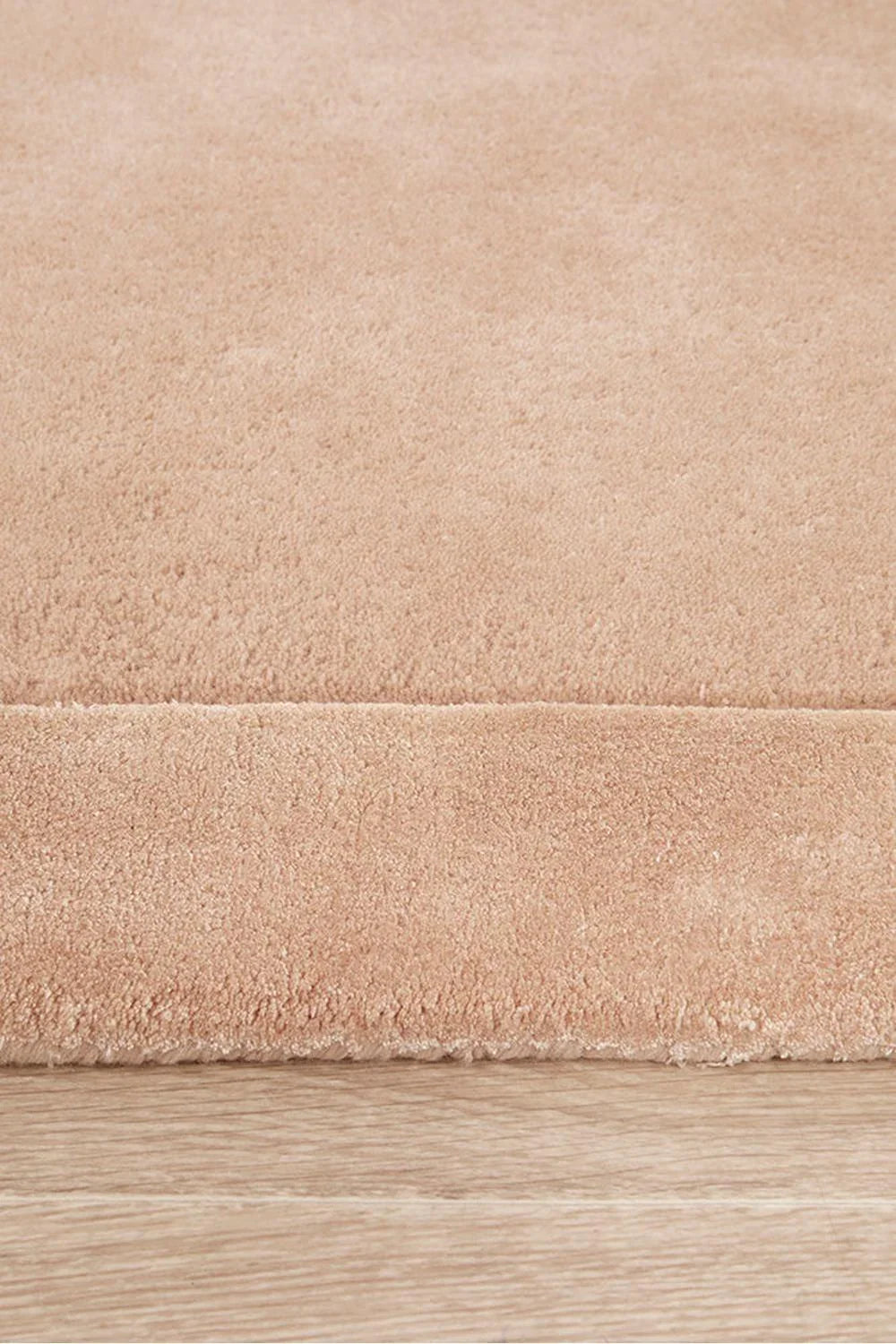 Hugo Nude Runner Rug featuring solid/plain design in nude beige on light oak background, machine-made polyester