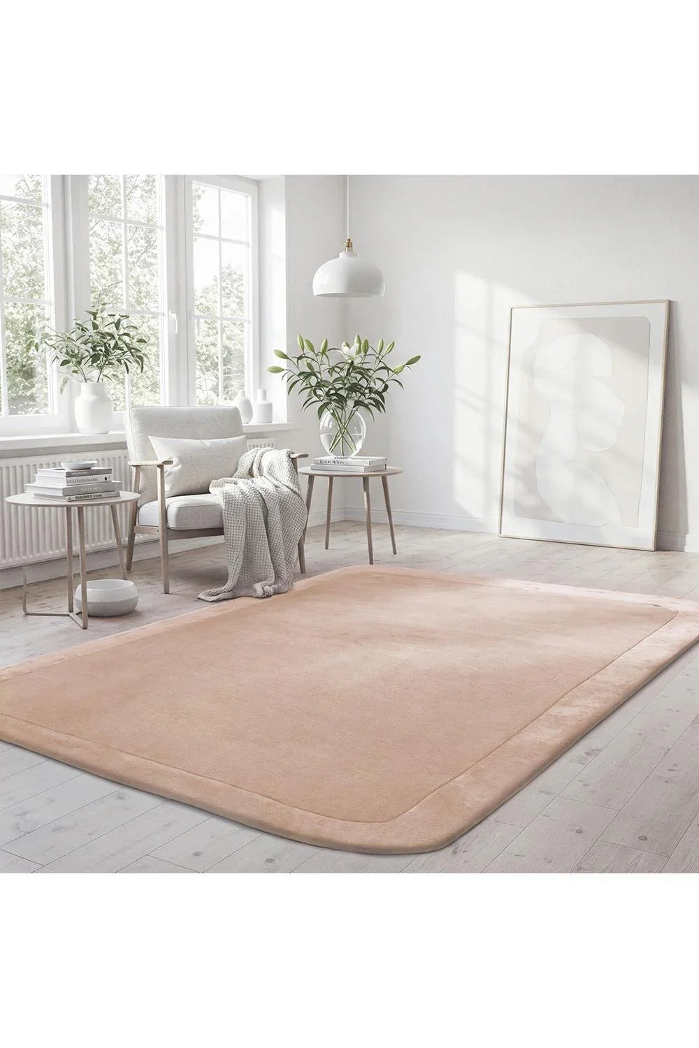 Hugo Nude Rug featuring minimalist solid design in peach nude, blush, cream on light beige background, hand-tufted wool