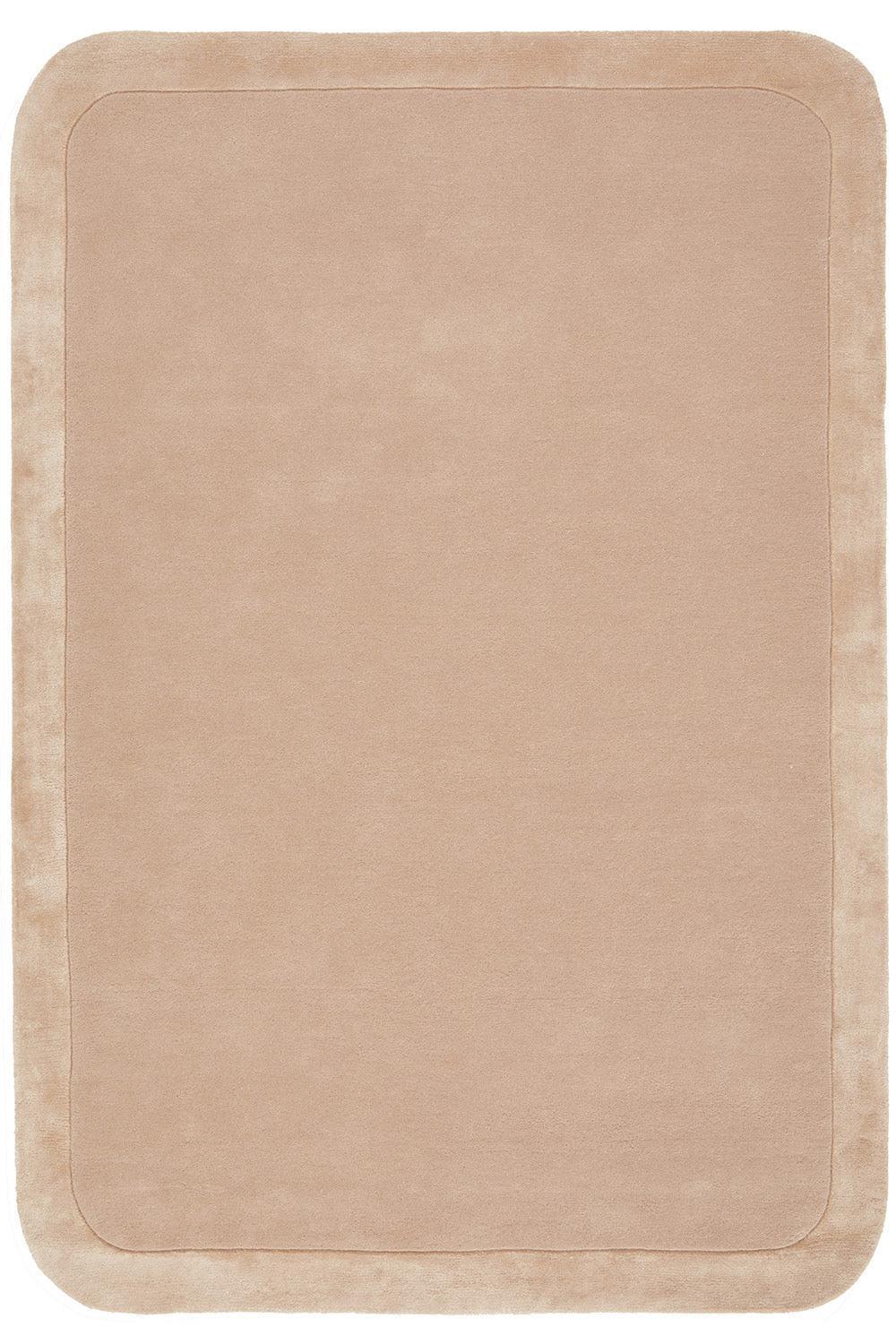 Hugo Nude Rug featuring solid minimalist design in nude beige with a subtle inner border on ivory background, hand-tufted wool