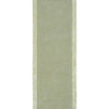Long rectangular green rug on a white background