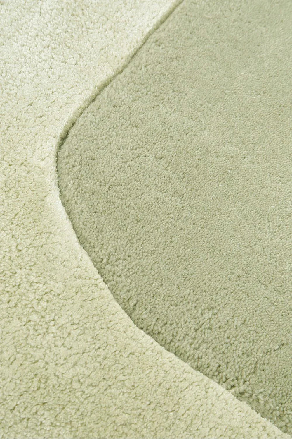 Hugo Sage Runner Rug featuring abstract curved-panel pattern in sage green and cream on pale cream, hand-tufted wool