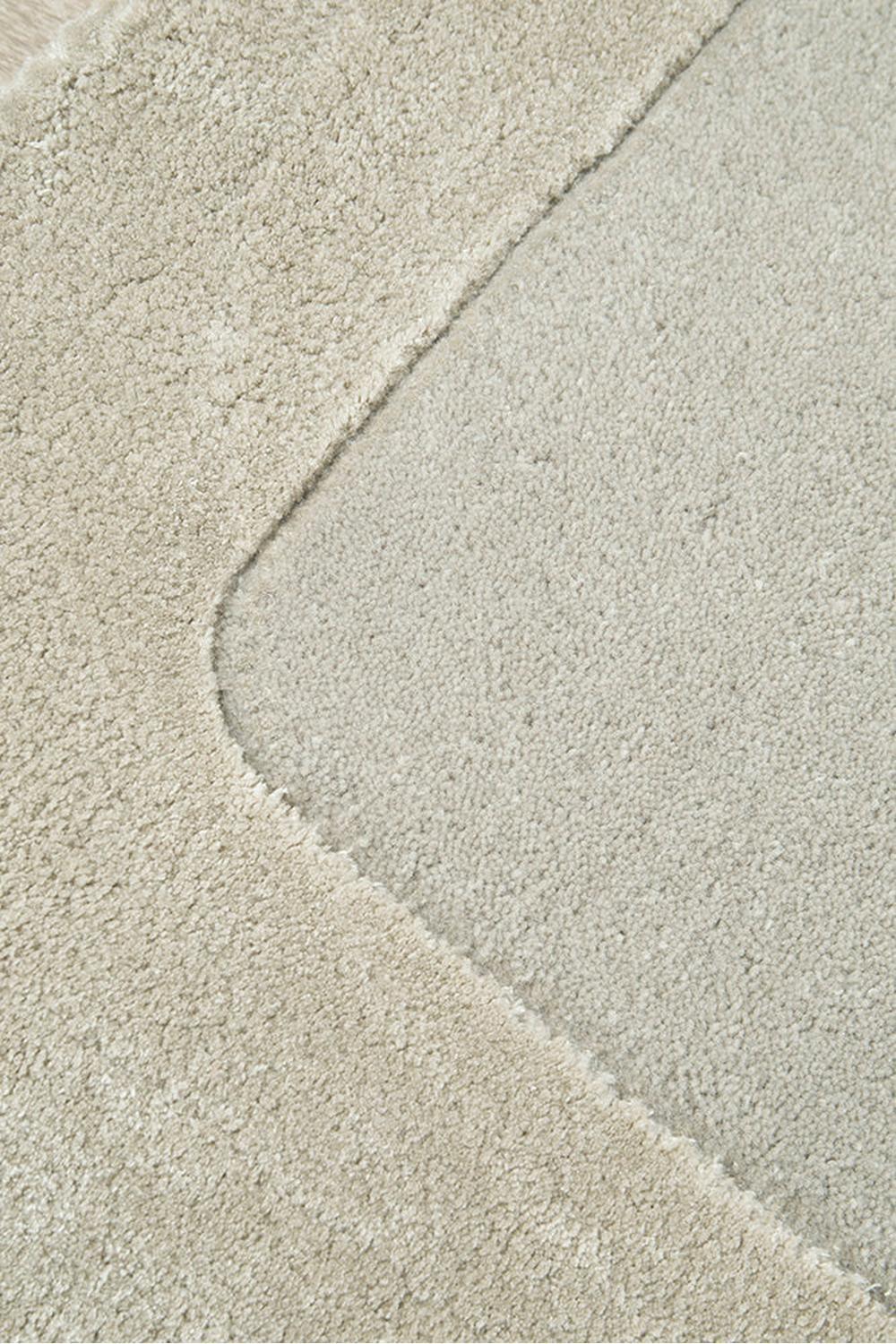 Hugo Silver Runner Rug featuring beige and silver-grey shaggy pile with diagonal seam panels.