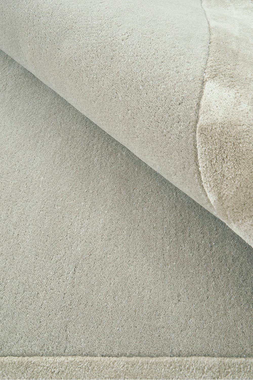 Hugo Silver Runner Rug featuring textured solid pattern in silver, grey and cream on light beige background, hand-tufted wool