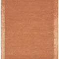 Rectangular brown bath mat with a textured surface on a white background