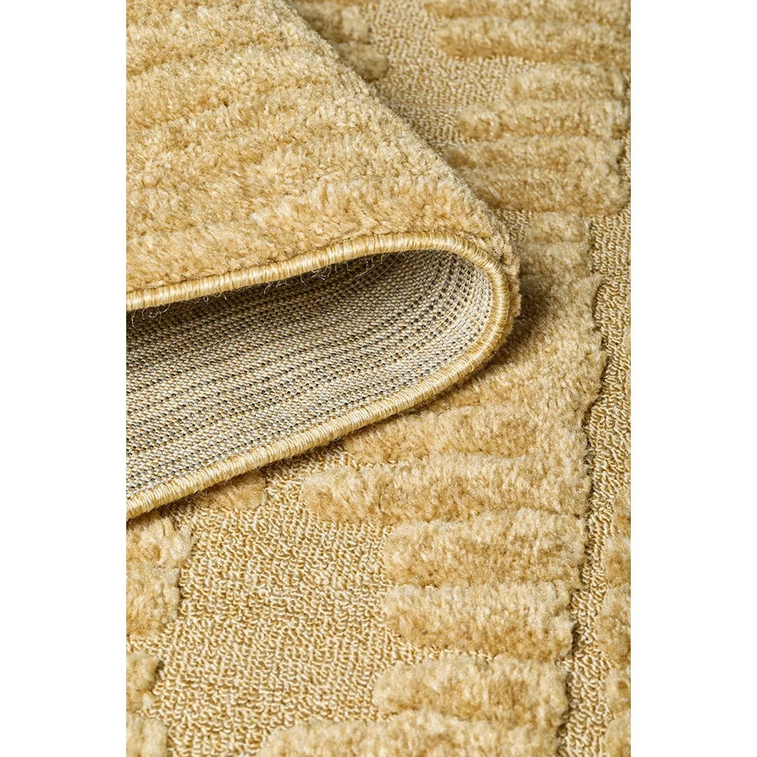 Haven Aliya Gold Rug featuring textured shaggy pattern in gold, honey and beige on cream background, machine-made polypropylene