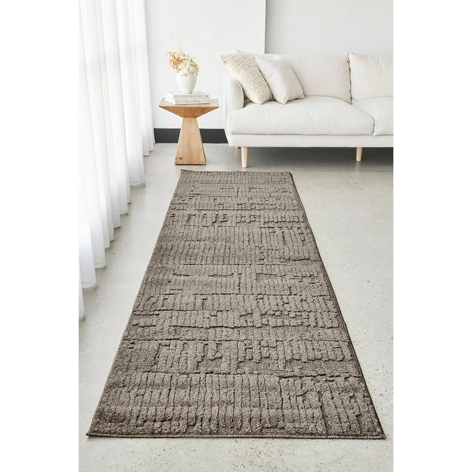 Haven Aliya Mocha Rug featuring textured geometric blocks in mocha, taupe and cream on light grey background, tufted wool