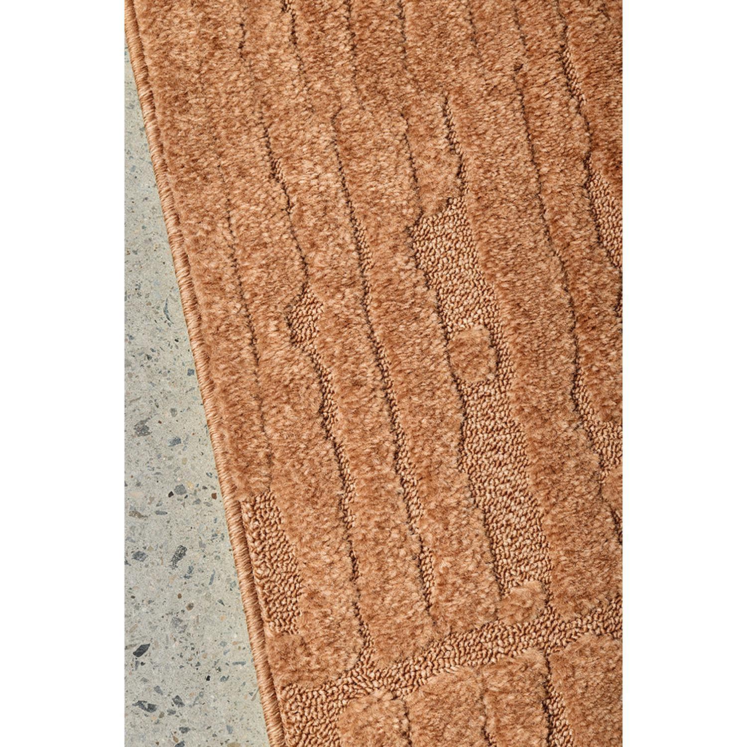 Haven Aliya Rust Rug featuring geometric brick pattern in rust, copper, chocolate on grey background, machine-made polypropylene
