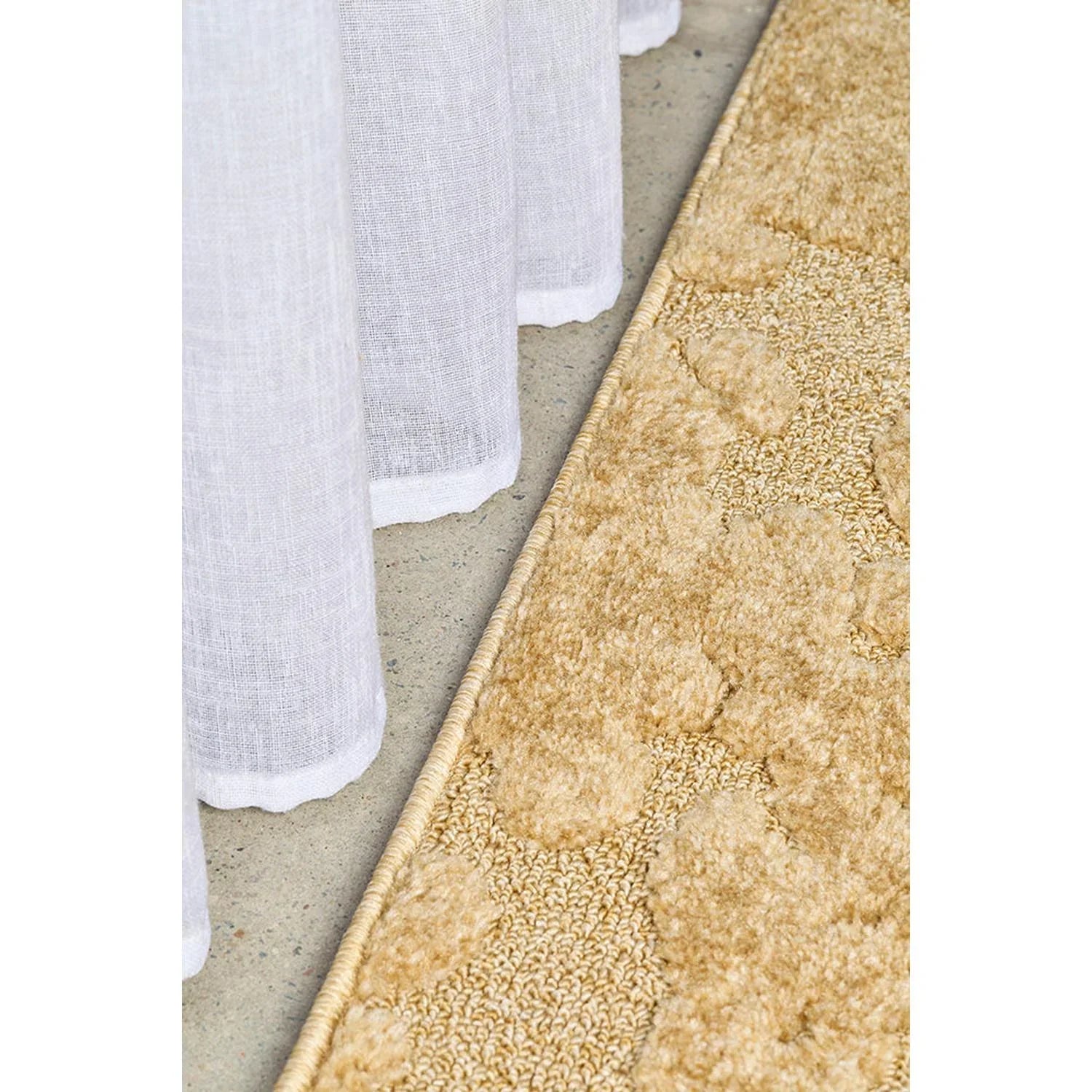 Haven Nyla Gold Rug featuring textured floral pattern in gold, tan and cream on light beige background, hand-tufted wool