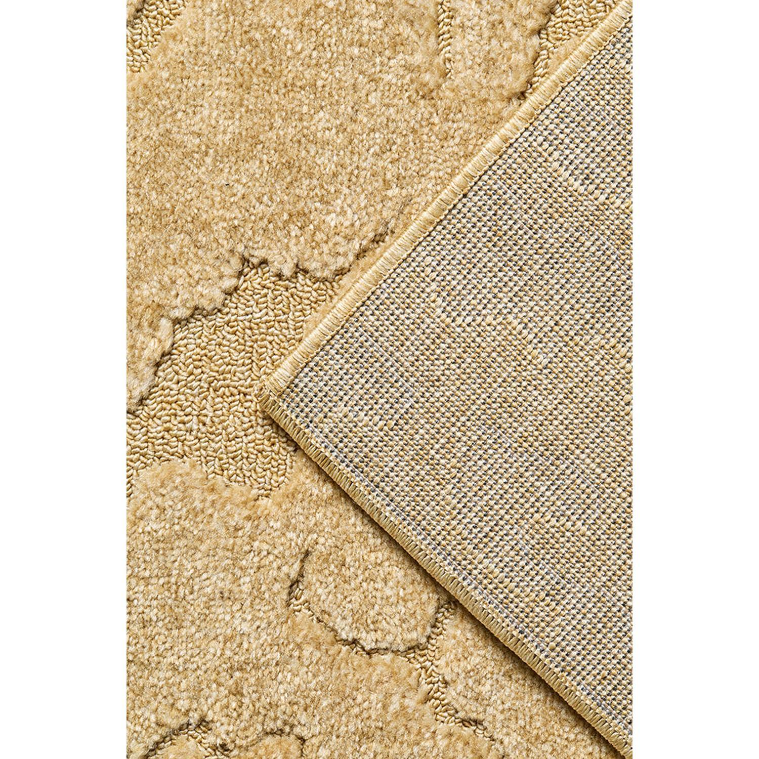 Haven Nyla Gold Rug featuring plush textured pattern in gold and cream on ivory background, machine-made wool blend