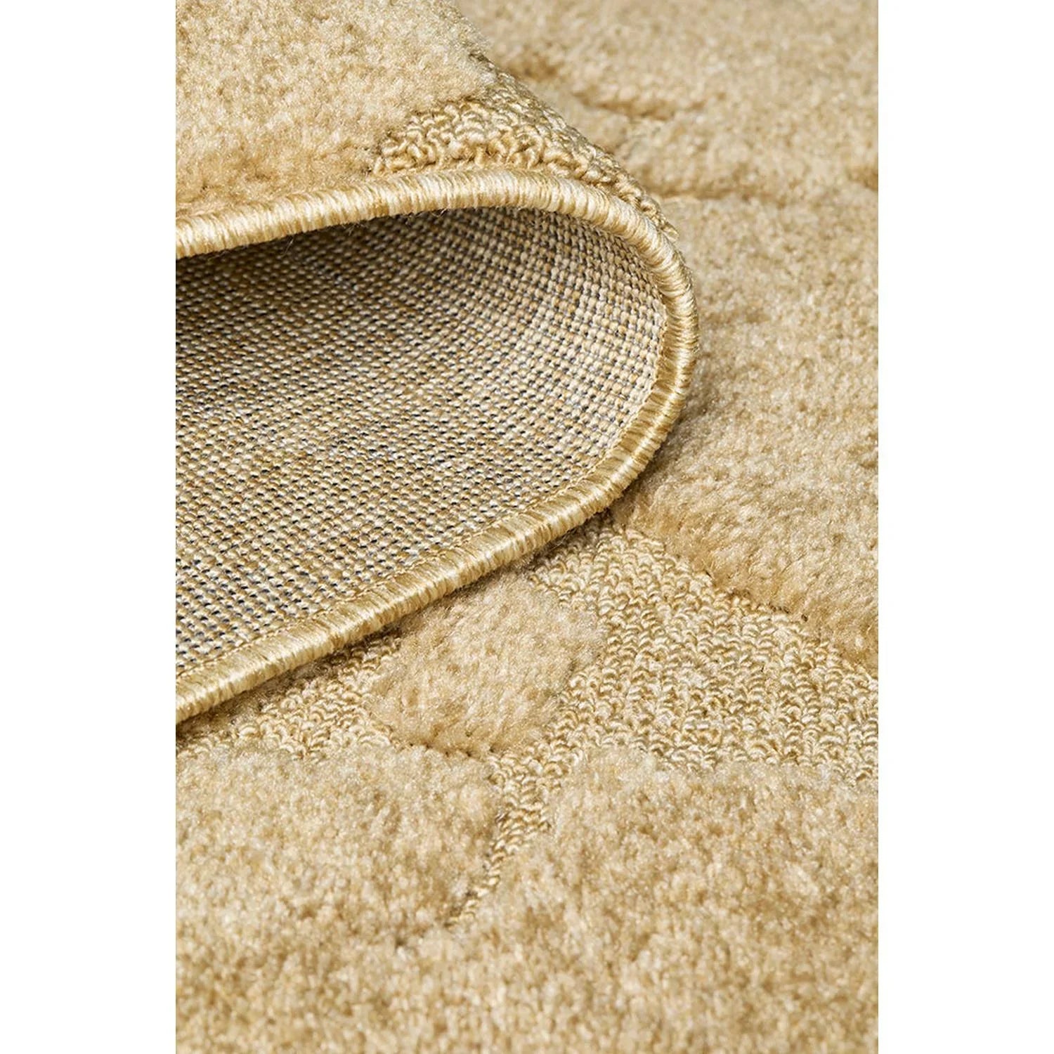 Haven Nyla Gold Rug featuring a subtle geometric tufted pattern in gold, cream and beige on warm ivory background, hand-tufted wool