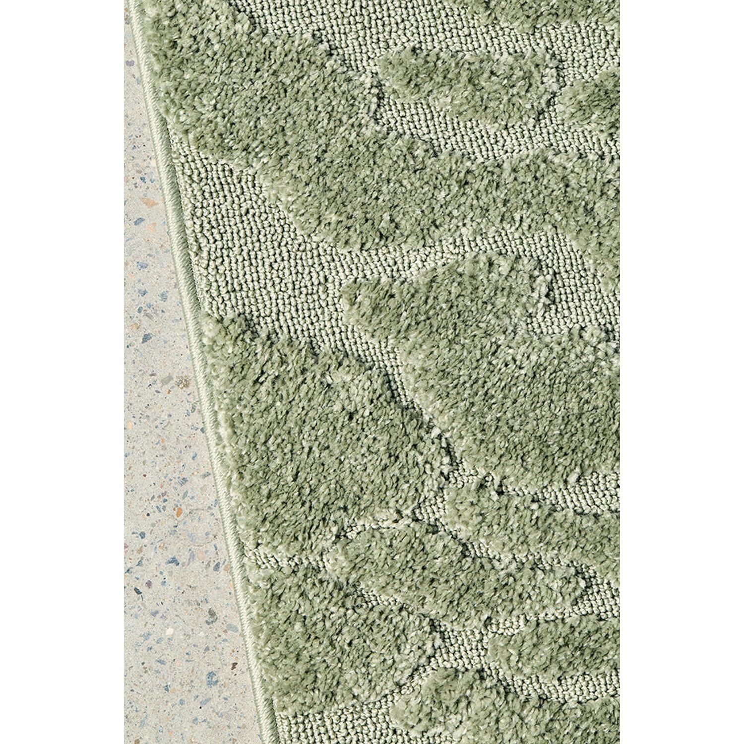 Haven Nyla Green Rug featuring abstract botanical pattern in olive green, sage green, emerald on light cream background, machine-made polypropylene