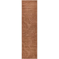 Brown textured rug on a white background